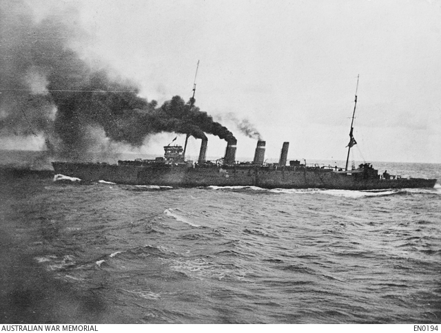 Sydney steaming towards Rabaul in September 1914. This is the first Sydney, not the Second World War cruiser. Archive credit strip retained.
